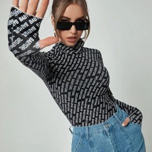 Thumb Holes Allover Letter Graphic Tee